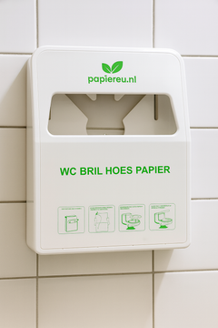wandhouder voor wc-brilhoezen in toiletruimte