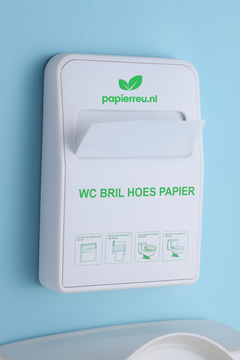 close-up van wandhouder voor wc-brilhoezen